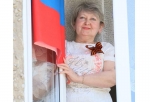 Омичи присоединились к всероссийской акции «Флаги России. 9 мая»