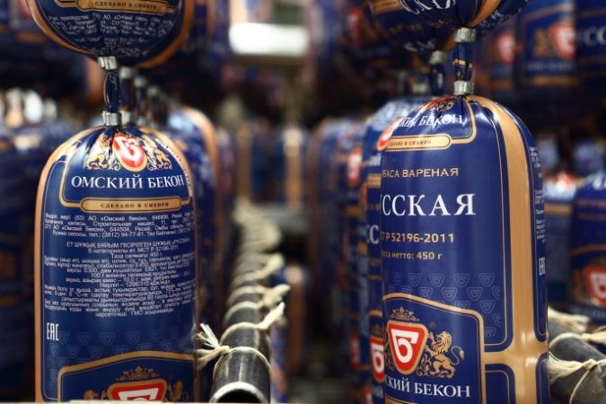 Сайт омского бекона. Омский бекон. Омский бекон продукция. Омский бекон здание. Омский бекон производство.